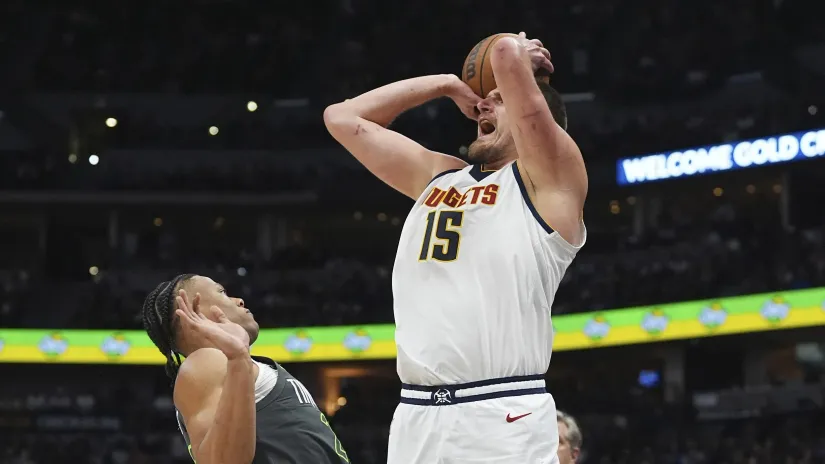 Džejlen Klark i Nikola Jokić (Guliver/AP Photo/David Zalubowski)